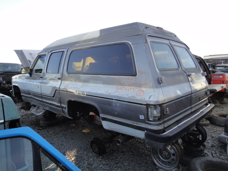 High top converted Suburban, was lifted too. Would have made an amazing camper.